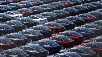 Tesla cars in a parking lot