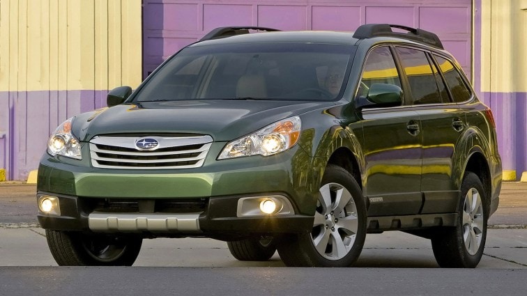 2012 Subaru Outback in green.