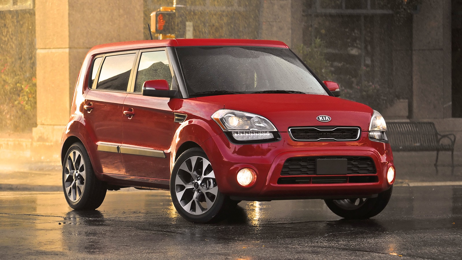 2013 Kia Soul in red.