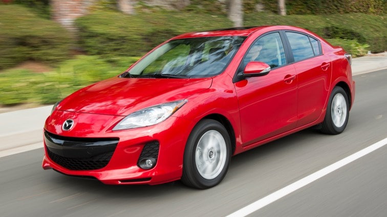 2013 Mazda3 in red.
