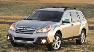 2013 Subaru Outback in silver.