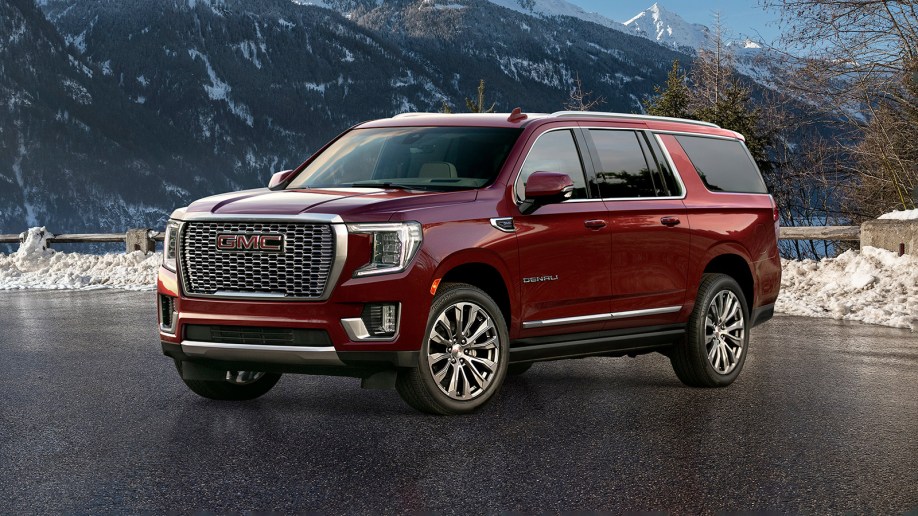 2021 GMC Yukon denali XL in Red in the mountains
