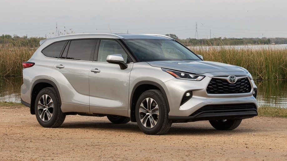 2021 Toyota Highlander in silver near a field