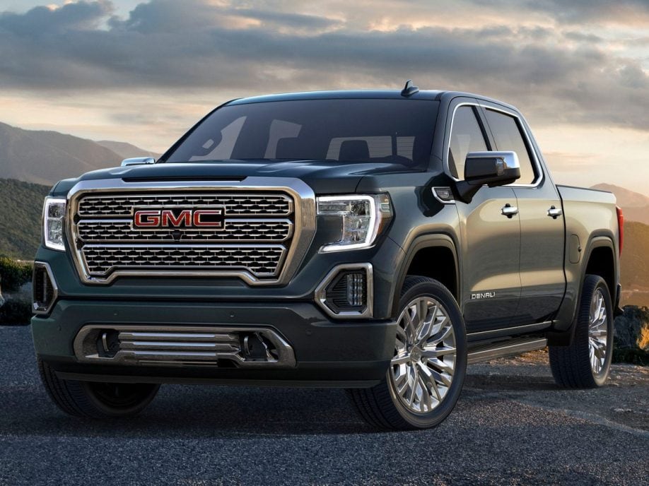 2021 GMC Sierra Denali with green hills