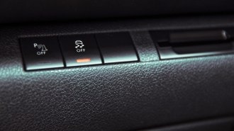 Traction control button in a car.