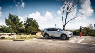 The 2022 Hyundai Santa Fe PHEV seen in profile