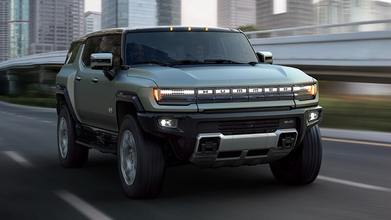 Hummer EV SUV on the highway driving.