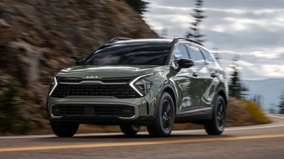 https://www.kbb.com/wp-content/uploads/2021/10/2023-Kia-Sportage-X-Pro-green-driving-front-3qt.jpg?w=918