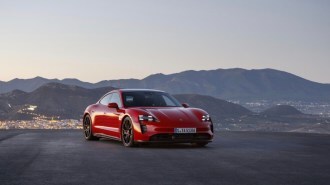 2022 Porsche Taycan GTS in red.