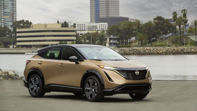 The 2023 Nissan Ariya in bronze, seen from a front quarter angle