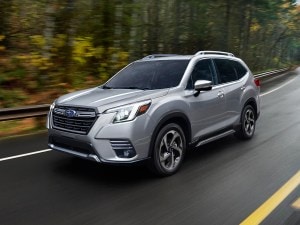 2022 Subaru Forester driving,in silver.