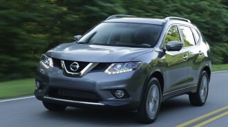 2014 Nissan Rogue Driving Front Three Quarter