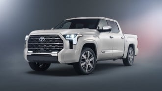 The 2022 Toyota Tundra in white, seen from a front quarter angle