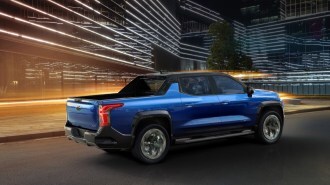 The 2024 Chevrolet Silverado EV seen from a rear quarter angle