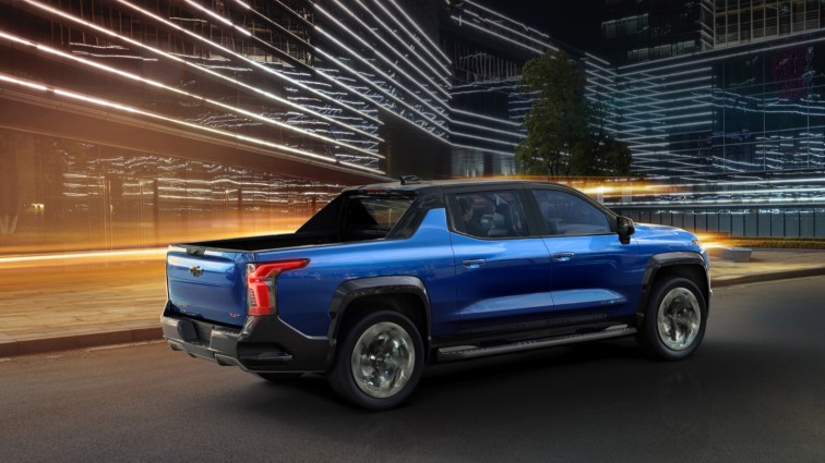 The 2024 Chevrolet Silverado EV seen from a rear quarter angle