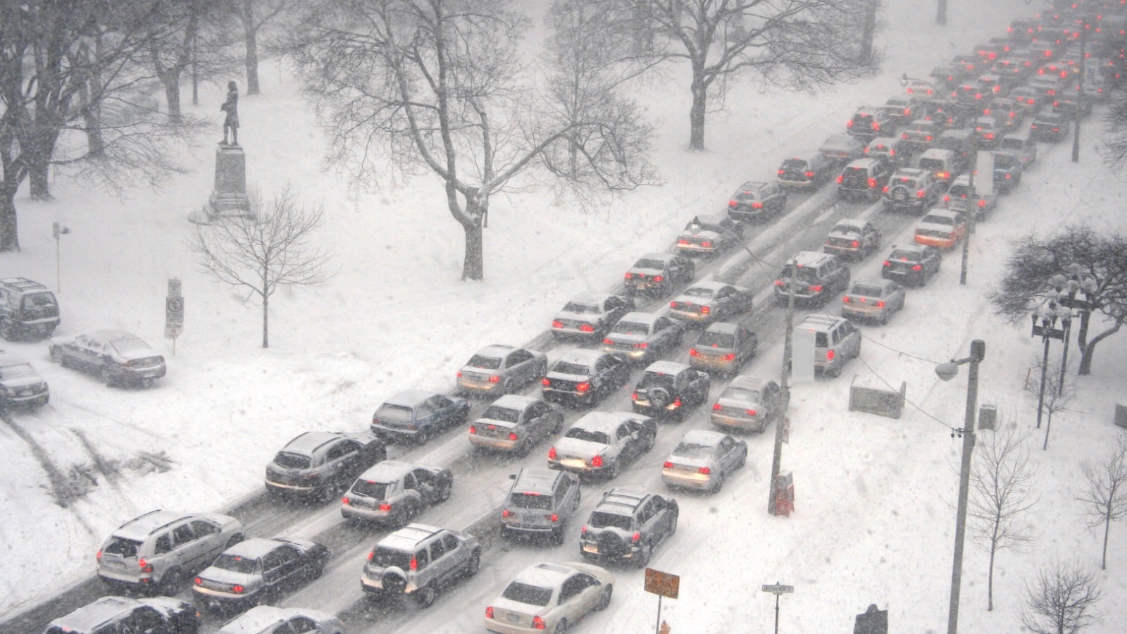 EVs and other cars in blizzard traffic