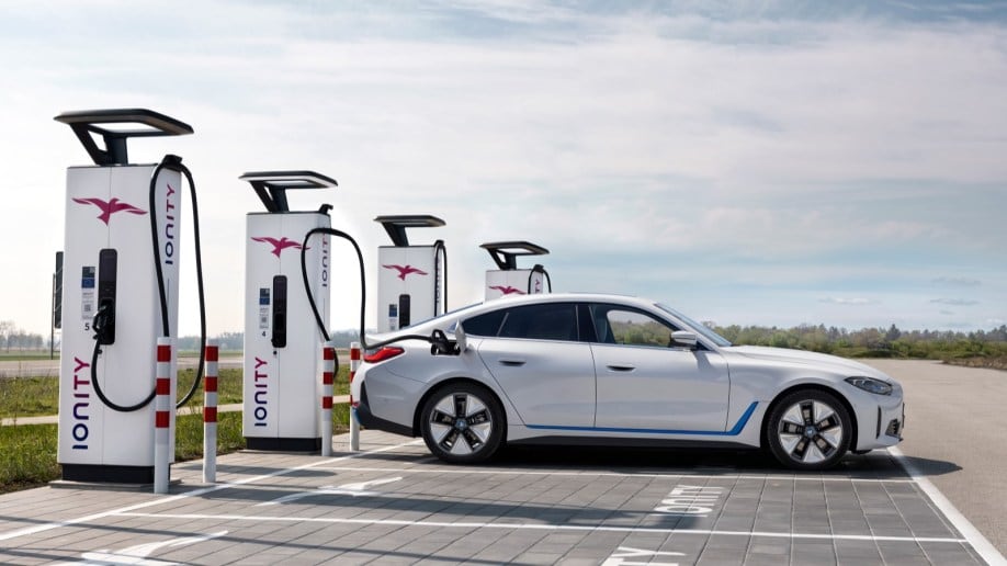 The 2023 BMW i4 plugged in to charge