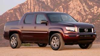 2008 Honda Ridgeline in maroon.