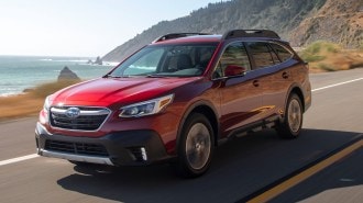 2022 Subaru Outback Limited in red.