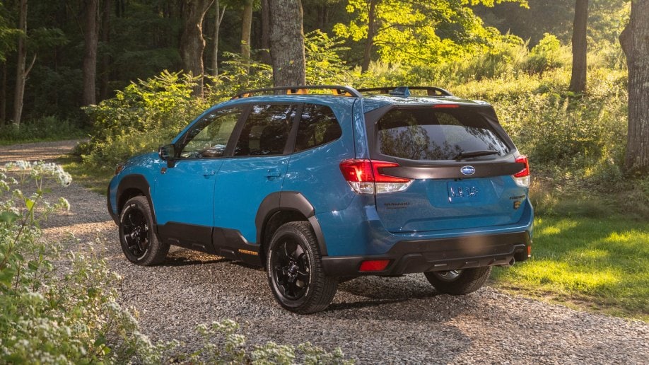 2022 Subaru Forester on dirt road in blue