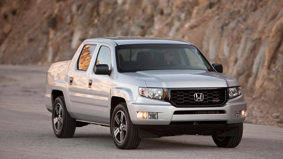 2012 Honda Ridgeline in silver.