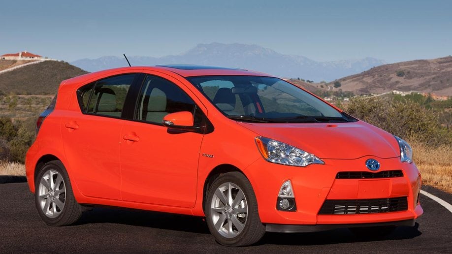 2012 Toyota Prius C in red.