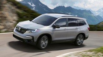 2022 Honda Pilot Sport driving on mountain road