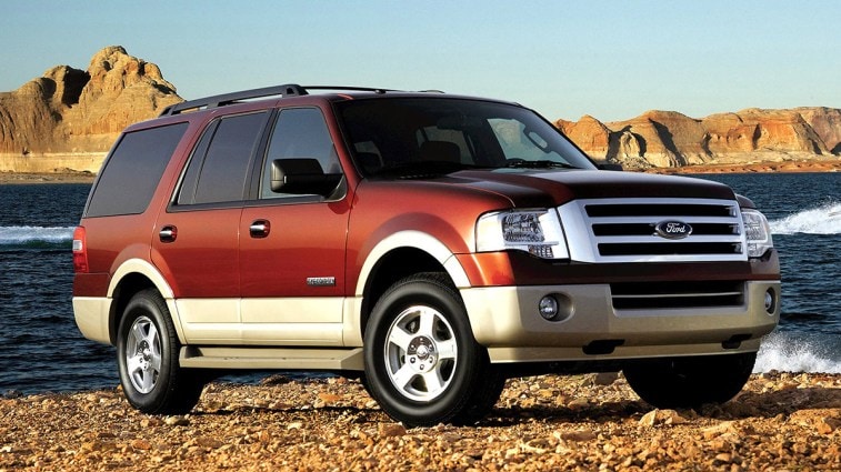 2013 Ford Expedition in red.