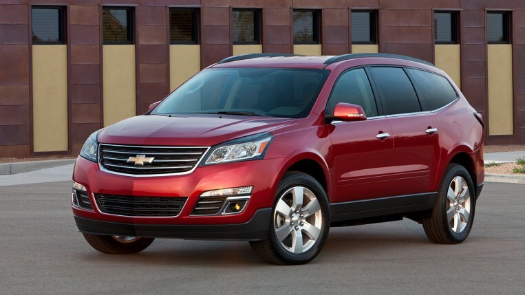 2014 Chevrolet Traverse in red.