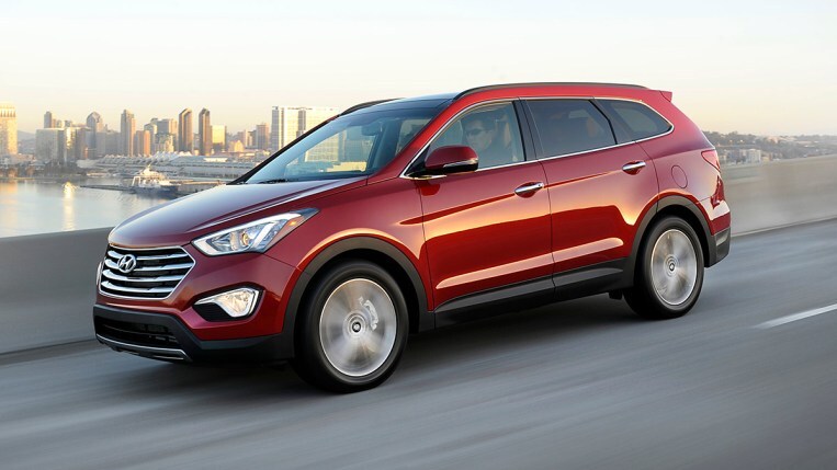 2014 Hyundai Santa Fe in red.
