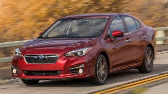 2018 Subaru Impreza in red.