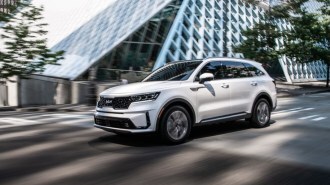 A white 2022 Kia Sorento Plug-In Hybrid in white as seen in profile