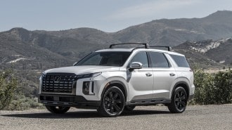 The 2023 Hyundai Palisade in white, seen from a front quarter angle