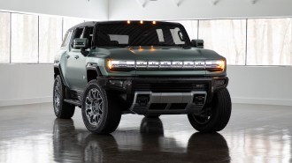 The 2023 GMC Hummer SUV seen from a front quarter angle