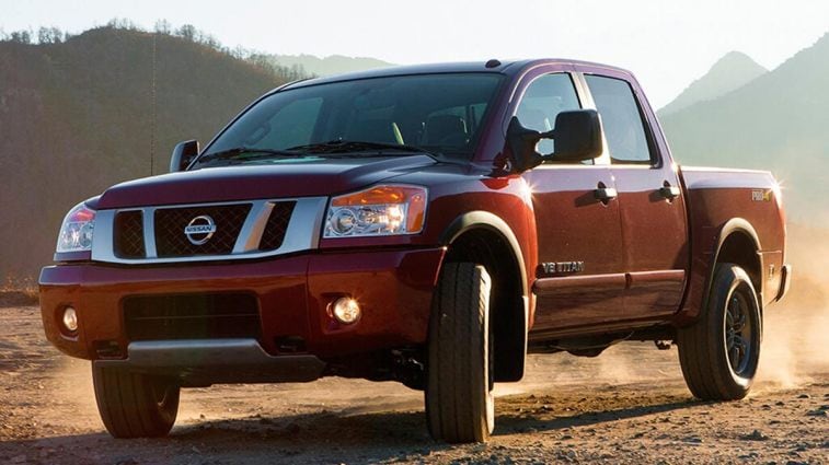 2014 Nissan Titan in red.