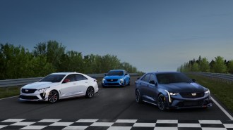 All three Cadillac CT4-V Blackwing Track Editions sit parked at a track finish line