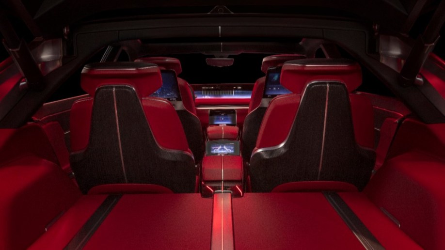 A teaser photo shows the cargo area of the Cadillac Celestiq show car. We see the back of the rear seats. They are upholstered in blood red leather, with black and brushed nickel accents.