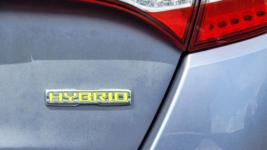 Hybrid badge on a car trunk