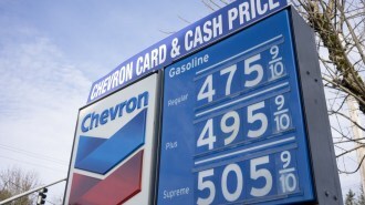 A photo showing gas prices at a Chevron station. Regular costs $4.76. Plus costs $4.96. Supreme costs $5.06