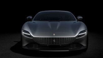 The 2022 Ferrari Roma in gray, seen from head-on