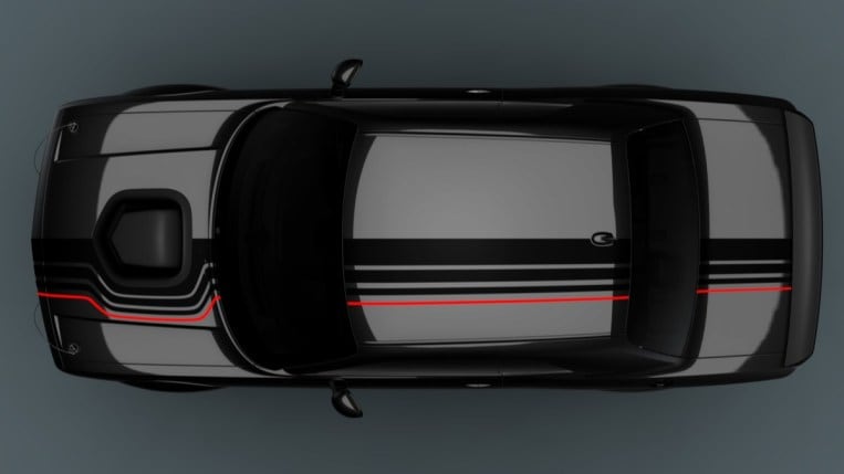 The 2023 Dodge Challenger Shakedown widebody seen from overhead. The car is semi-gloss black with three glossy black stripes and one red stripe.