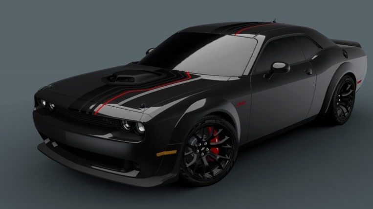 The 2023 Dodge Challenger Shakedown widebody seen from a front quarter angle. The car is semi-gloss black with three glossierblack stripes and one red stripe and a two-nostril shaker-style hood scoop