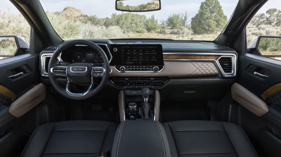 The 2023 GMC Canyon Denali's tri-tone interior, with wood trim and tan and black leather