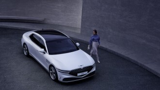 2023-Genesis-G90-front-quarter-overhead