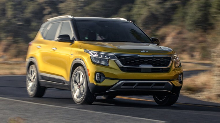 2023 Kia Seltos in gold, driving.