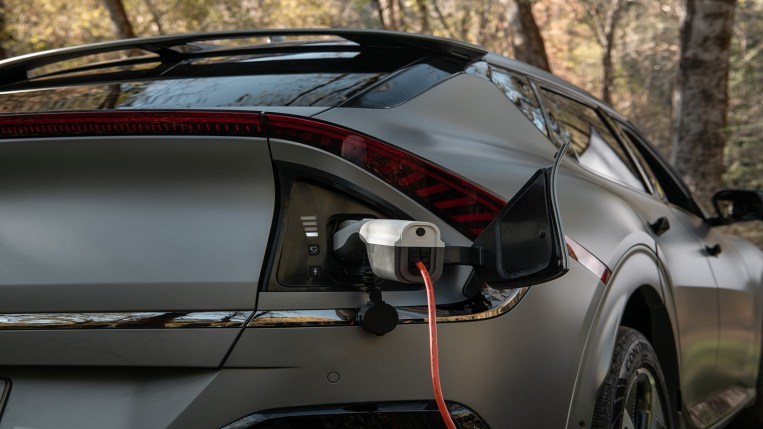 An EV6 connected to a charger