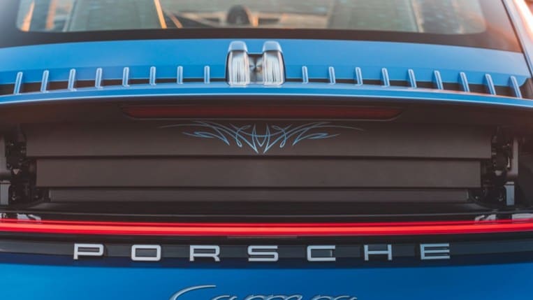 The tattoo visible when the speed-actuated rear wing of the Porsche Sally special edition raises