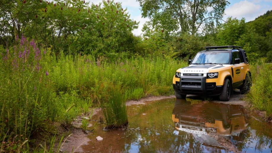 The 2023 Land Rover Defender Trophy Edition fords a small pond