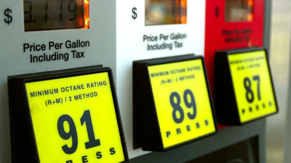 A closeup photograph of a fuel pump showing a price of $3.12
