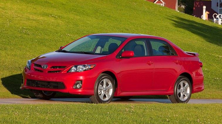2011 Toyota Corolla in red.